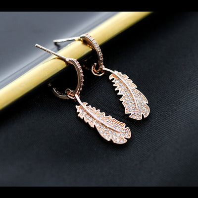Crash Landing on You Earrings | 925 Sterling Silver | Feather Design