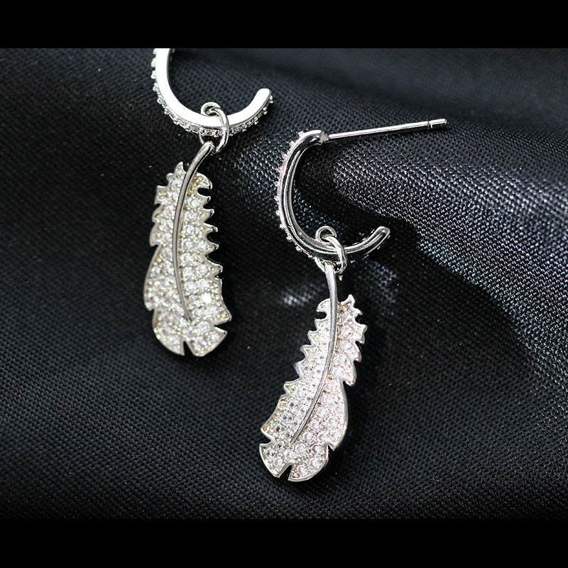 Crash Landing on You Earrings | 925 Sterling Silver | Feather Design